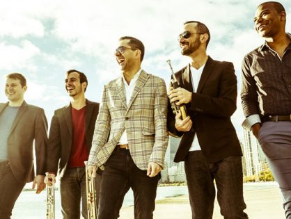 A Magical Garden Concert with Champagne, Canapés, and the Axiom Brass Quintet!