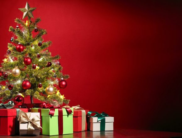 What is typically done in town in the way of gift giving and tipping during Christmas season?